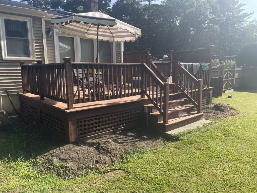 Experienced Deck Builder in Avon constructing a new composite deck