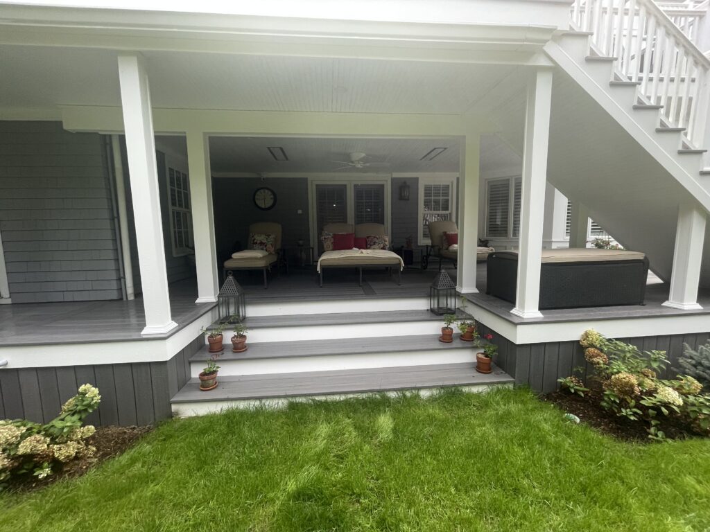 Experienced Deck Builder in Braintree constructing a new multi-level composite deck
