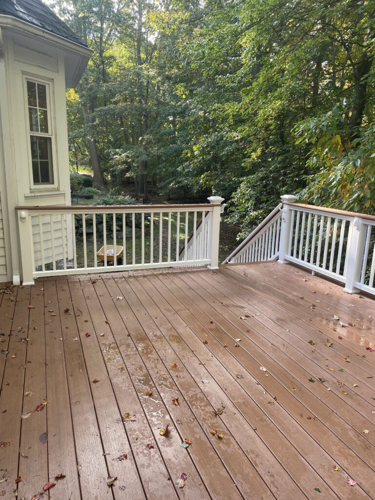 Experienced Deck Builder in Avon constructing a new composite deck