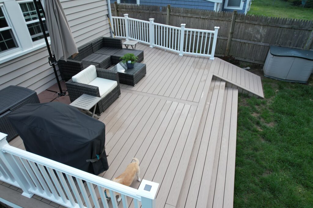 Experienced Deck Builder in Marshfield constructing a custom wooden deck